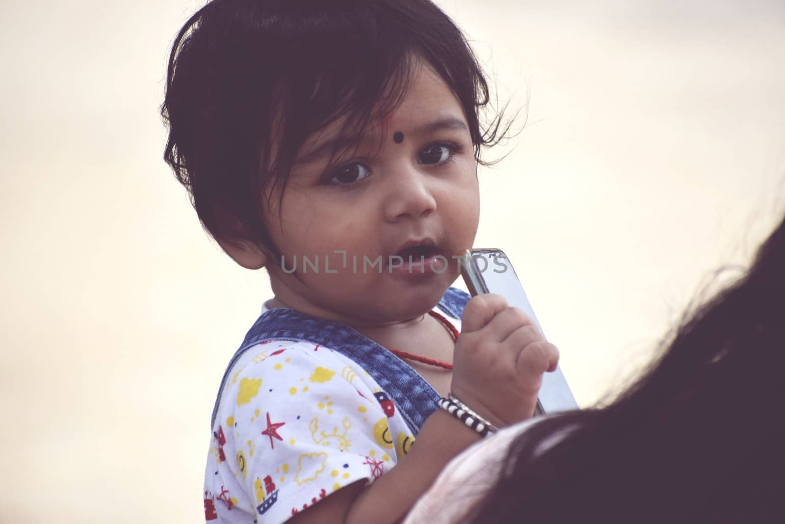 A cute Baby Girl in Joy Mood by ravindrabhu165165@gmail.com