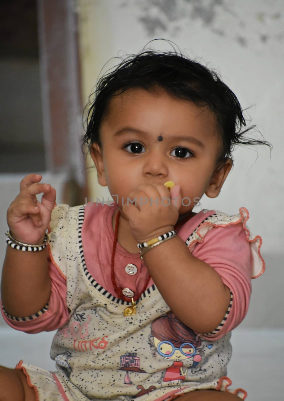 A cute Baby Girl in Joy Mood by ravindrabhu165165@gmail.com