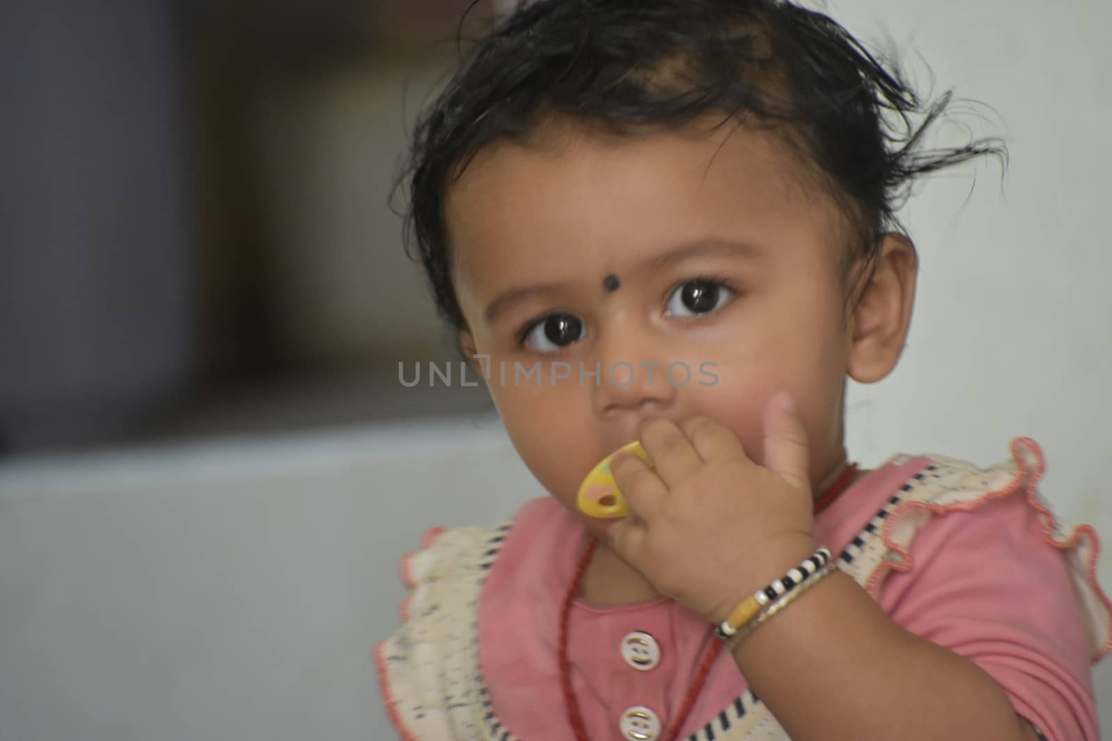 A cute Baby Girl in Joy Mood by ravindrabhu165165@gmail.com