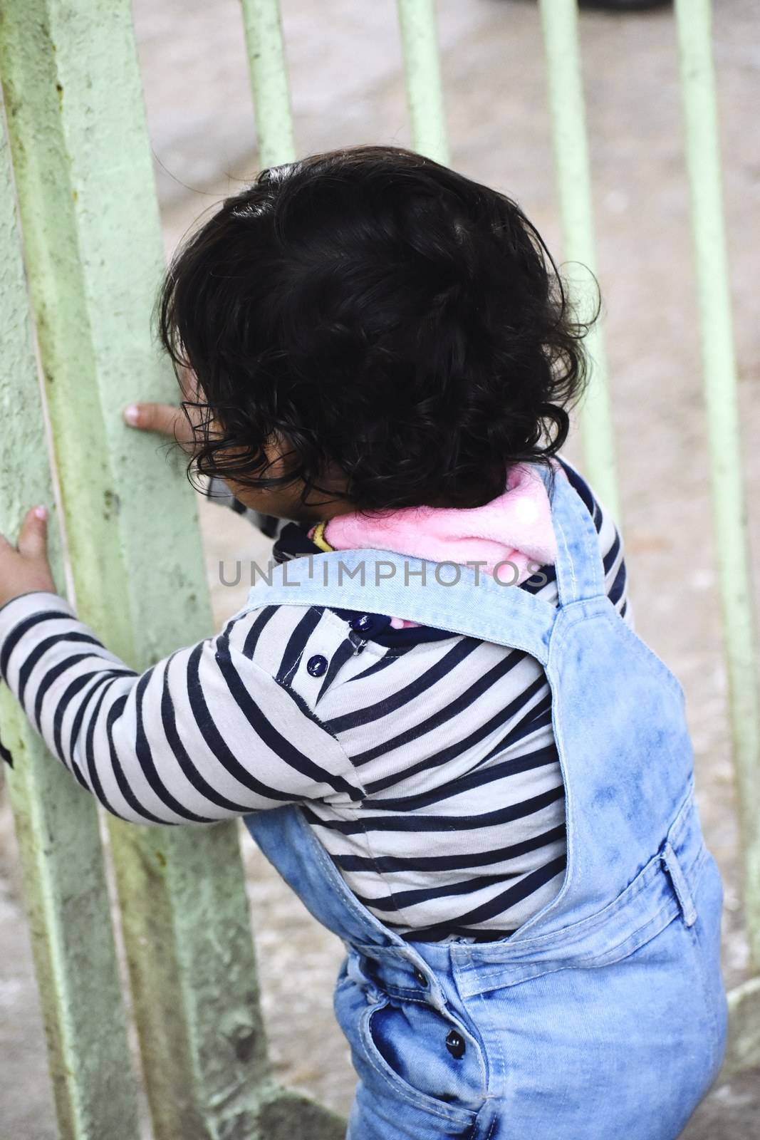A Cute Little baby in playground by ravindrabhu165165@gmail.com