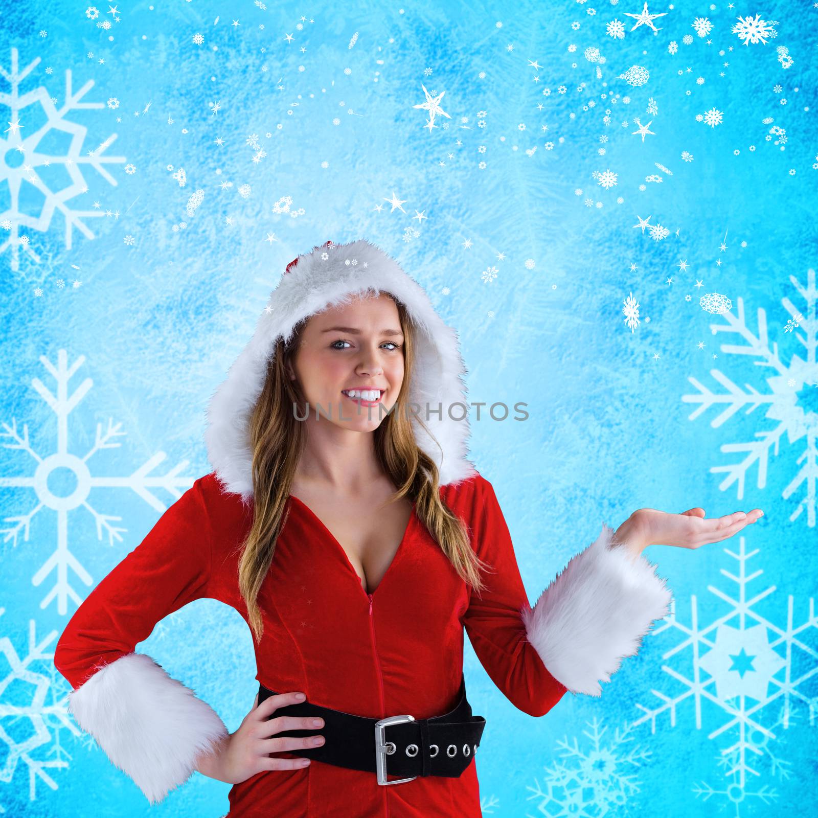 Sexy santa girl presenting with hand against blue snow flake pattern design