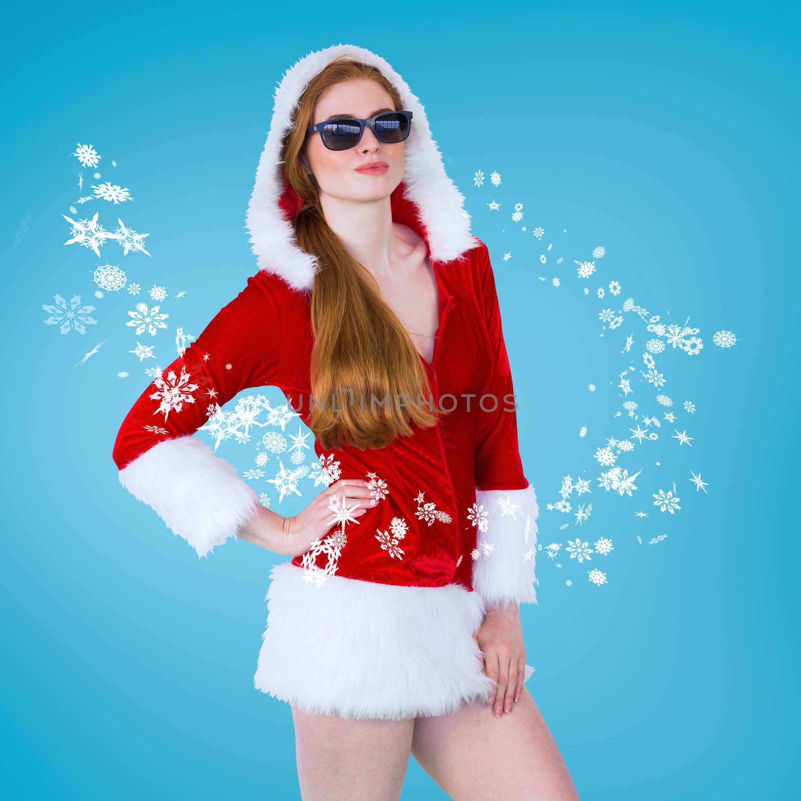 Composite image of cool santa girl wearing sunglasses by Wavebreakmedia