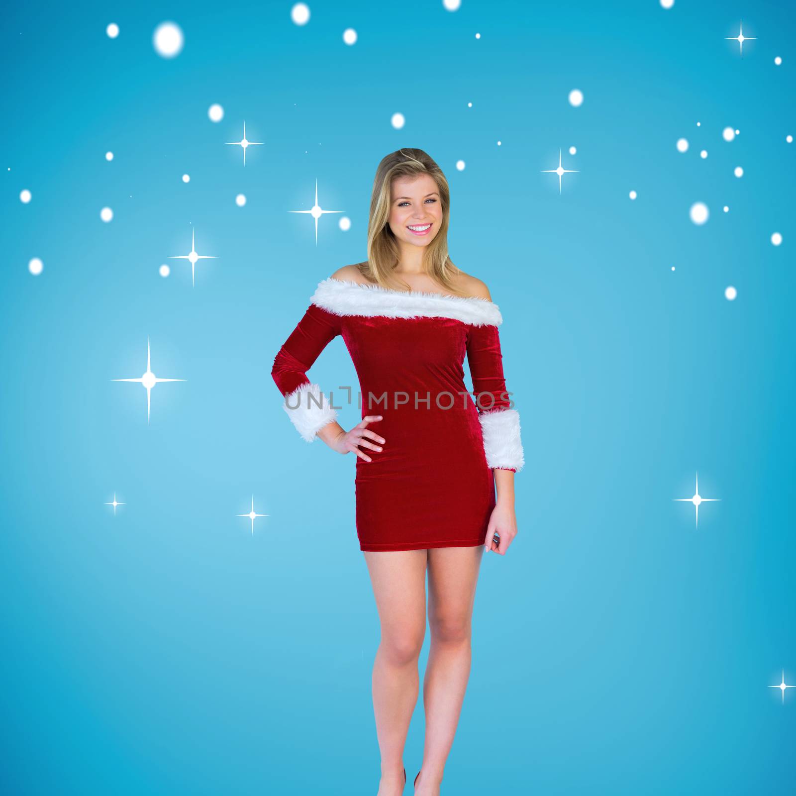 Composite image of pretty girl smiling in santa outfit by Wavebreakmedia