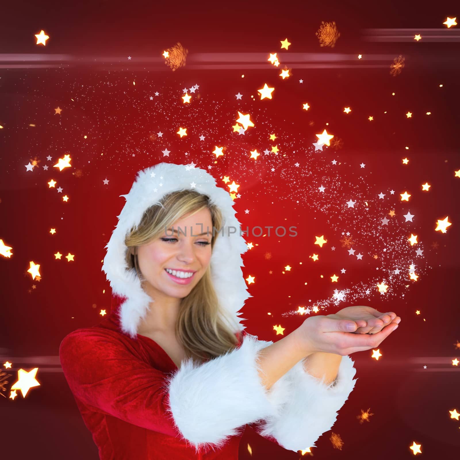 Pretty girl holding hands out in santa outfit against bright star pattern on red