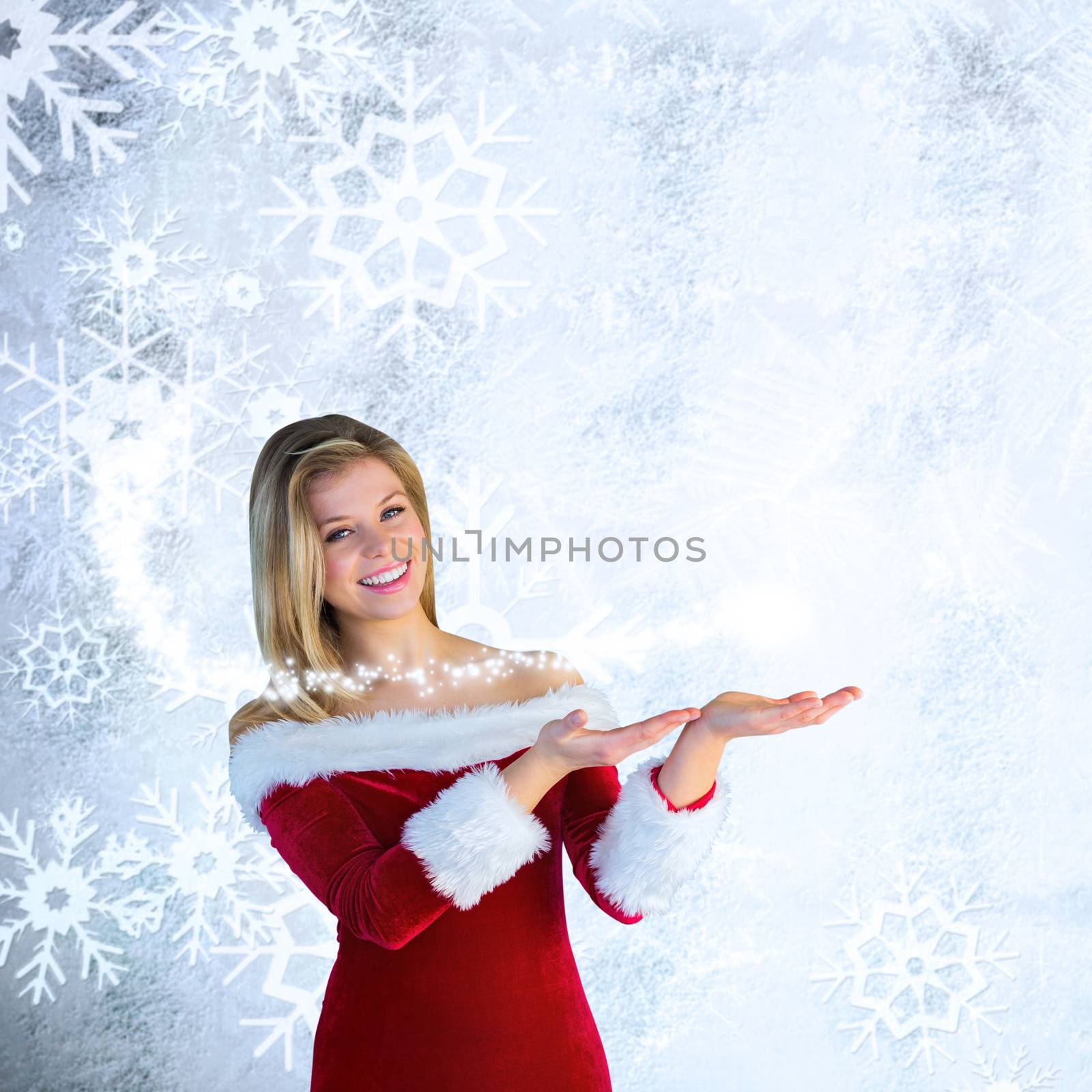 Pretty girl presenting in santa outfit against silver snow flake pattern design