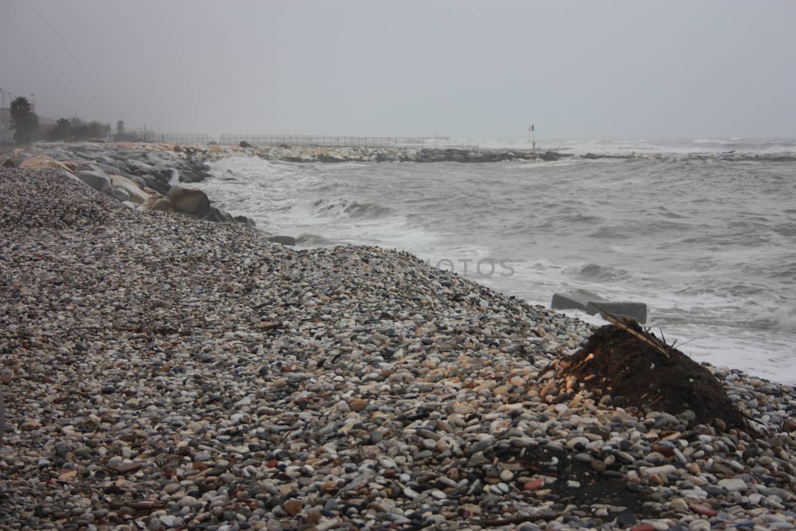 gray storm on small rocks of Liguria in a gloomy tragic day by alessiapenny90