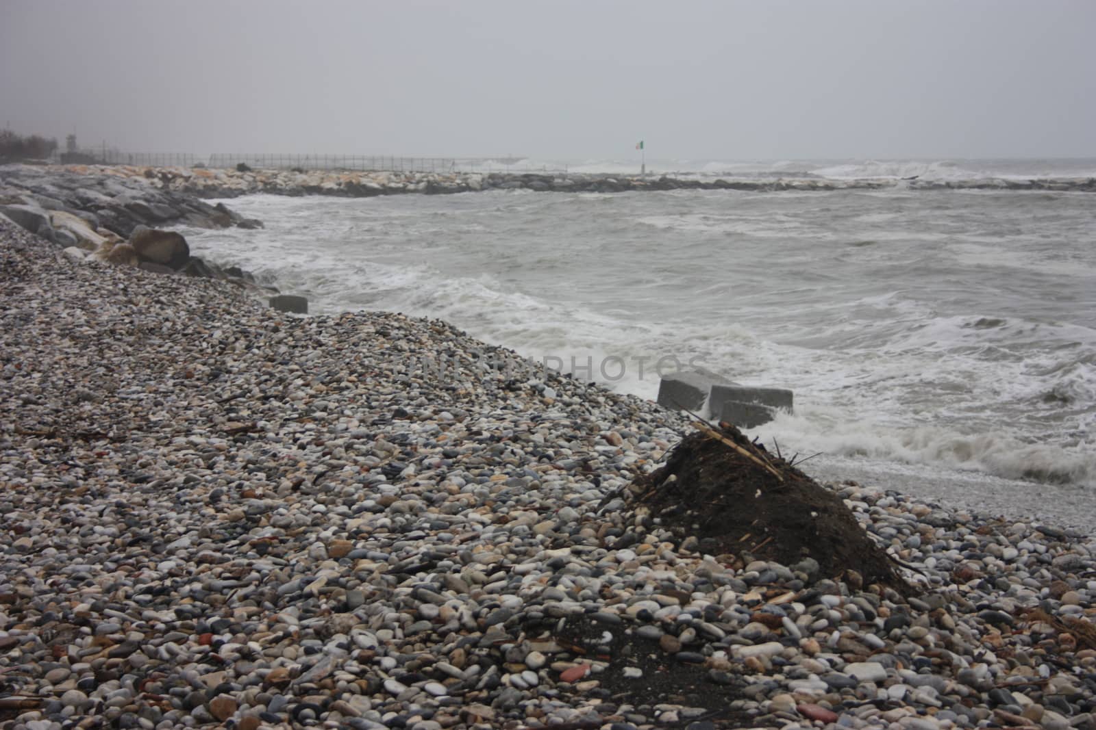 gray storm on small rocks of Liguria in a gloomy tragic day by alessiapenny90