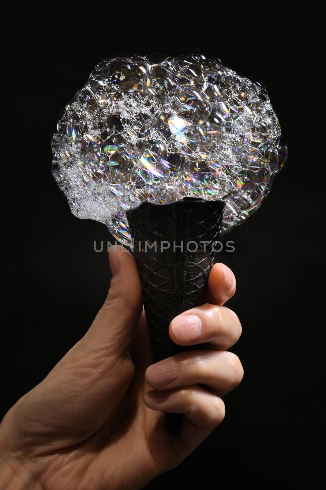 Abstract Black Waffle Cup and Soap Bubbles Isolated