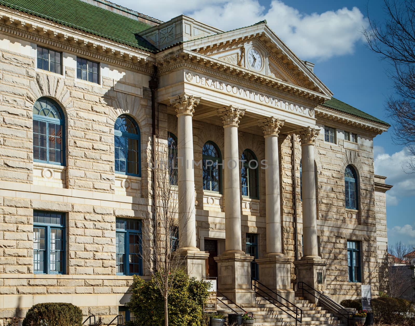 An old classic granite courthouse with columns