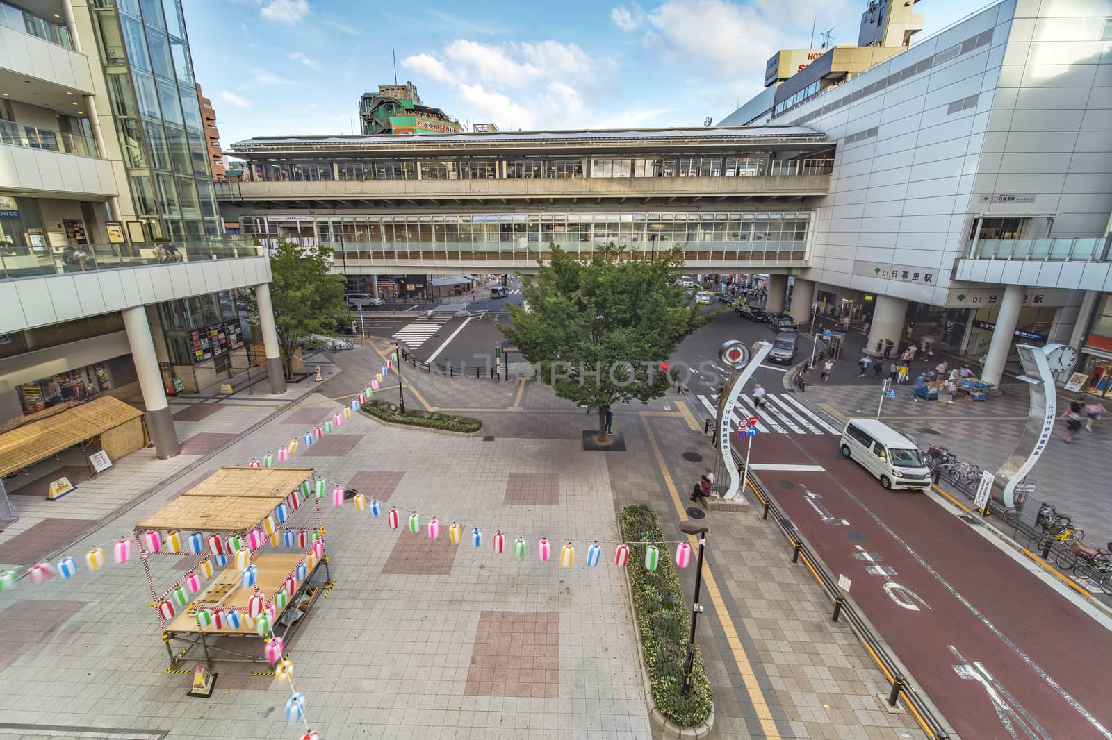 View of the square in front of the Nippori train station by kuremo