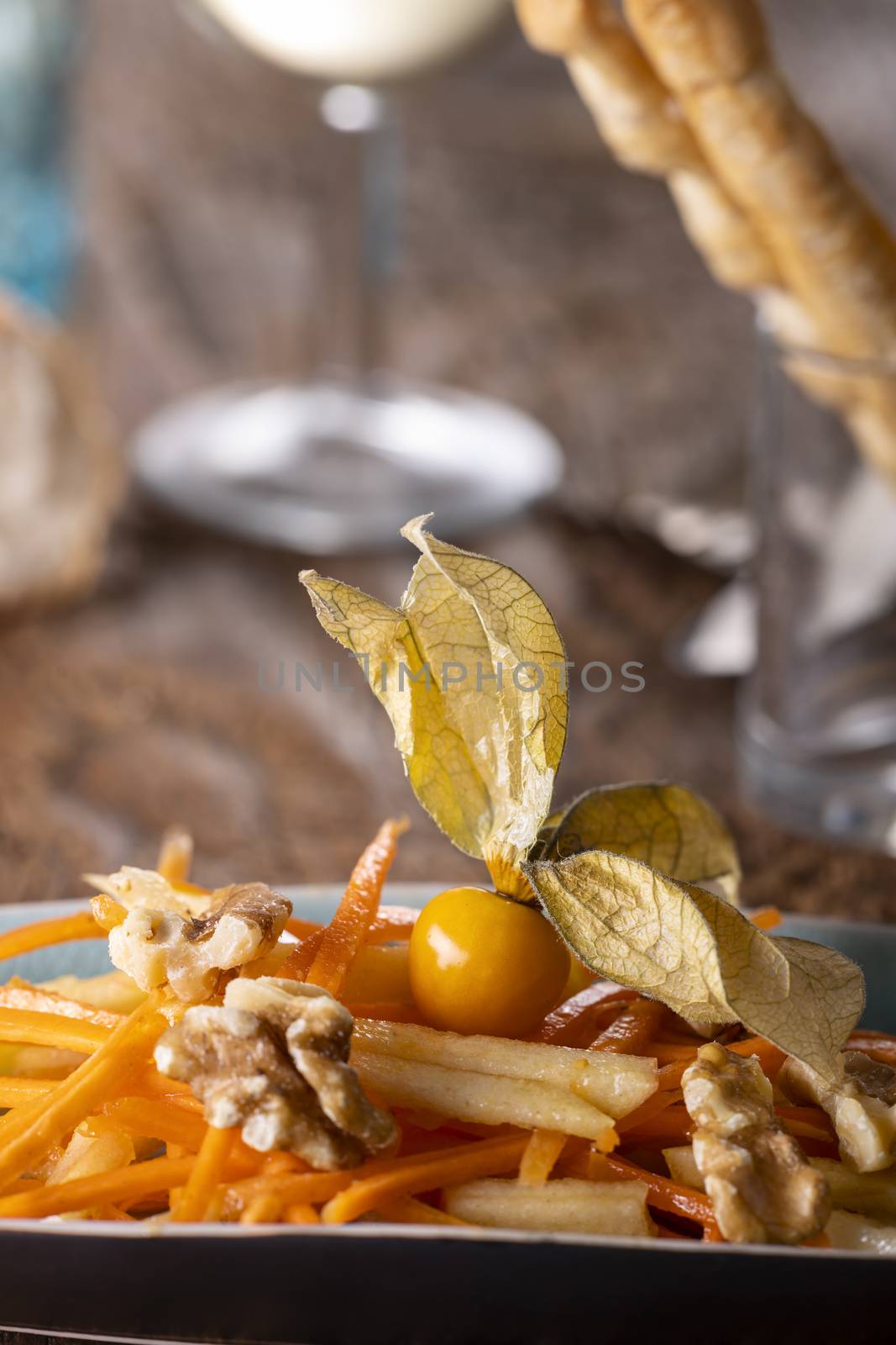 carrot and apple salad on wood