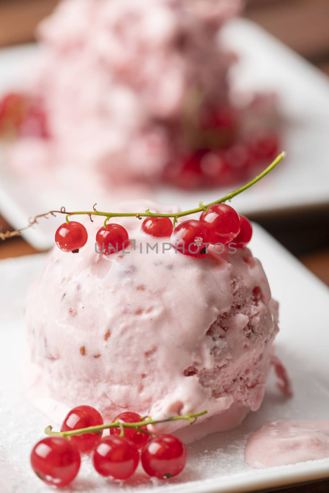 closeup of currant ice cream on a plate