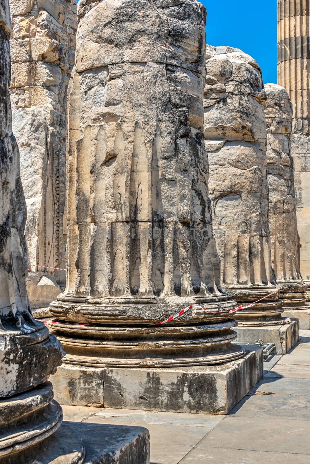 A base of a column of the eastern facade of the Temple of Apollo at Didyma, Turkey, on a sunny summer day