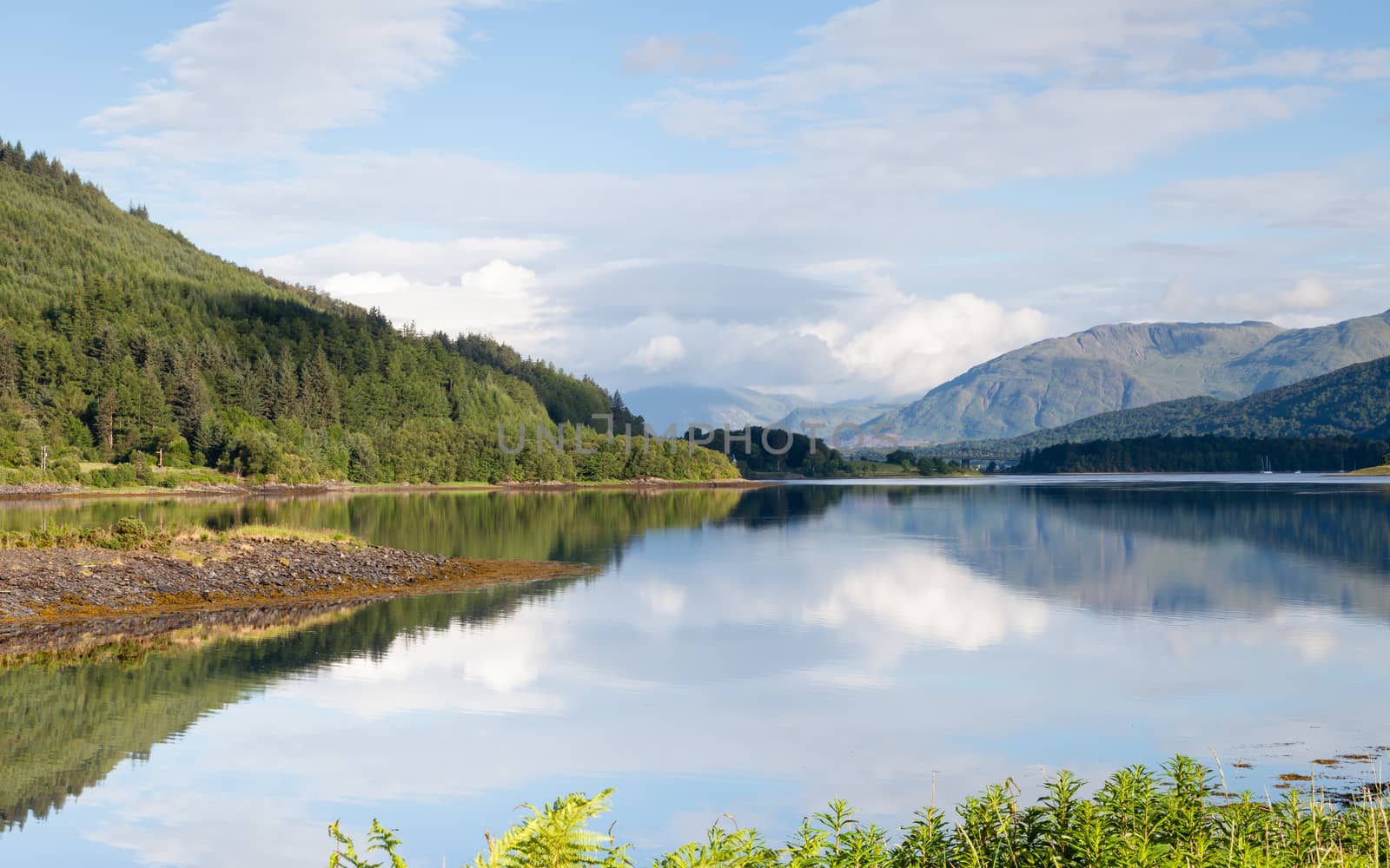 The view across Loch Leven from Ballachulish towards Ballachulish Bridge in the Scottish highlands.  Loch Leven is a sea loch on the west coast of Scotland.