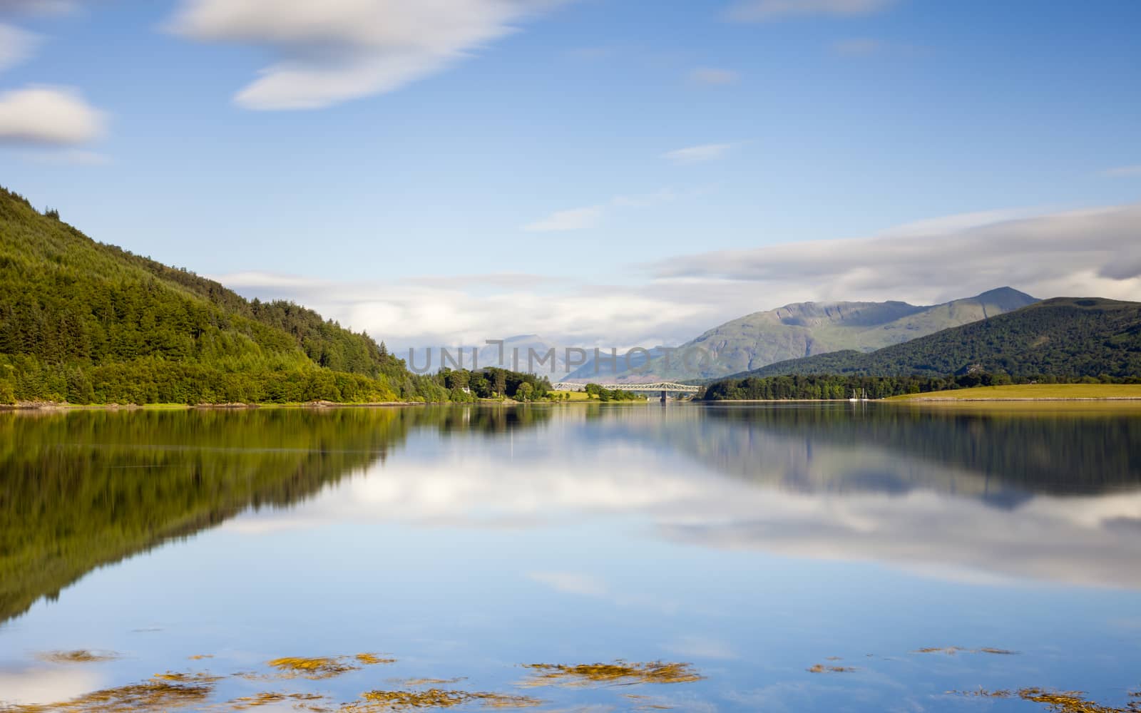 A long exposure of the view across Loch Leven from Ballachulish towards Ballachulish Bridge in the Scottish highlands.  Loch Leven is a sea loch on the west coast of Scotland.