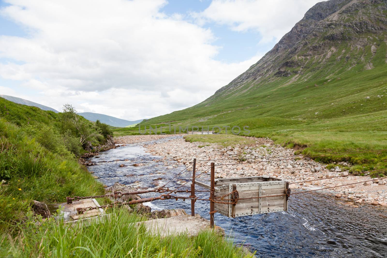 A sheep transporter is pictured crossing the River Etive in Glen Etive, a glen in the Scottish Highlands.