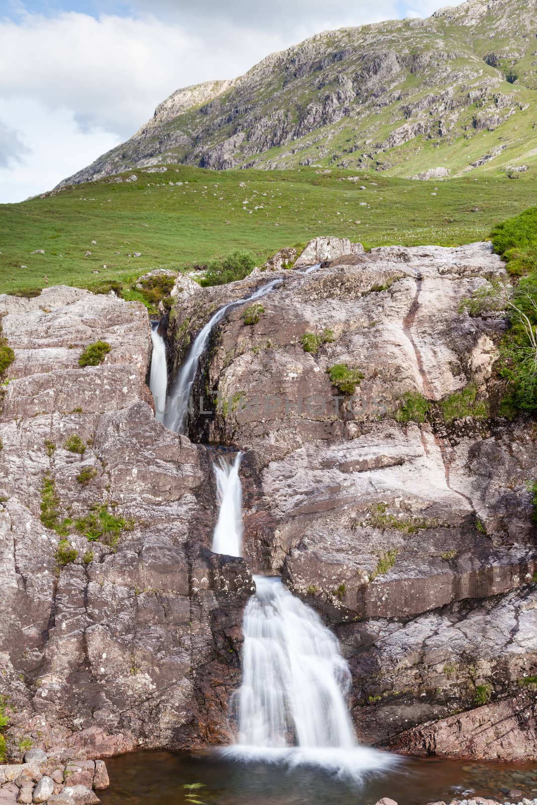 A waterfall in Glencoe in the Scottish highlands.  Glencoe is the most famous of all the Scottish glens.