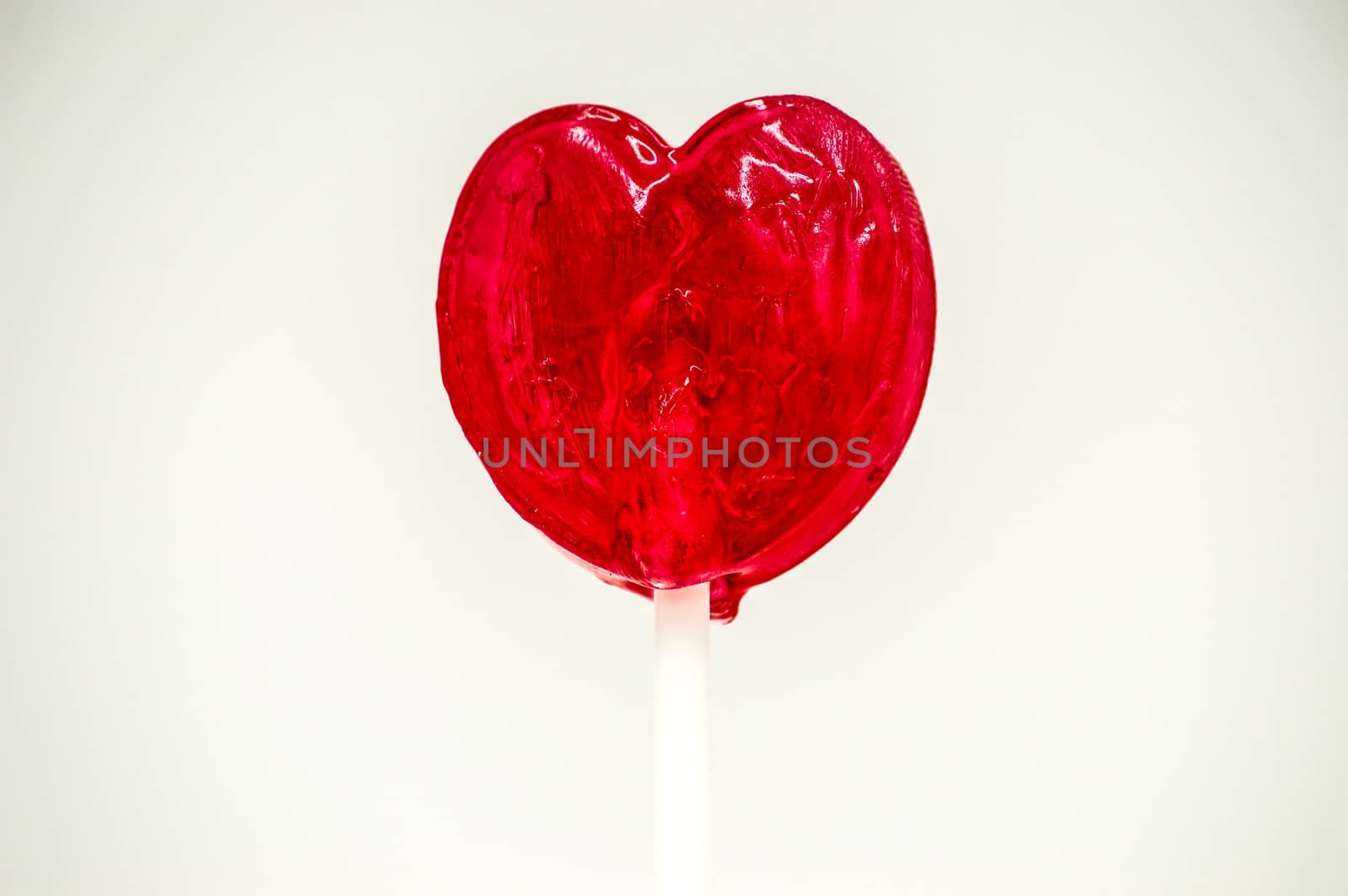 Heart shaped red lollipop  by Philou1000