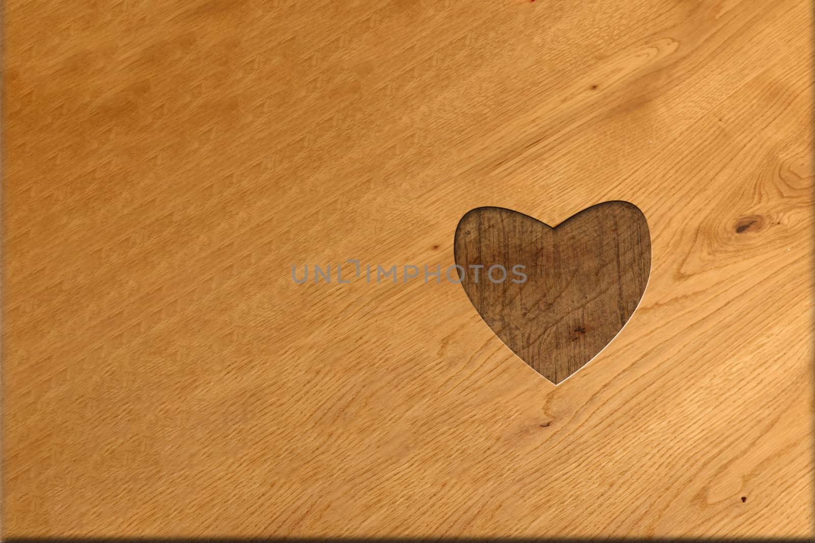 Valentines card for carpenters with a heart carved into the wood. with light and dark background