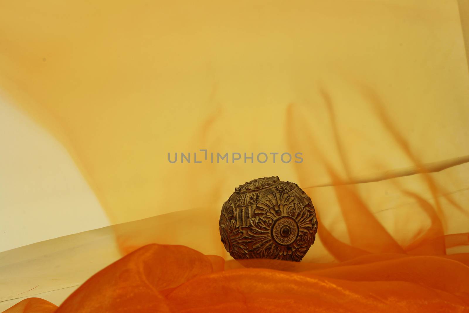 Orange back ground for various designs with a ball in the middle