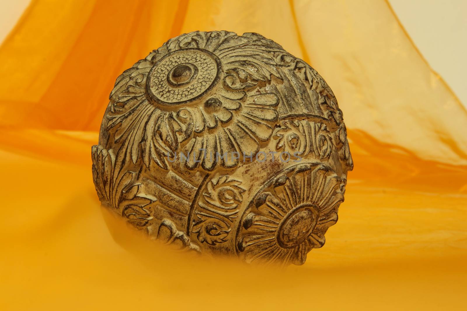 Orange background for various designs with copy space with a ball on foreground