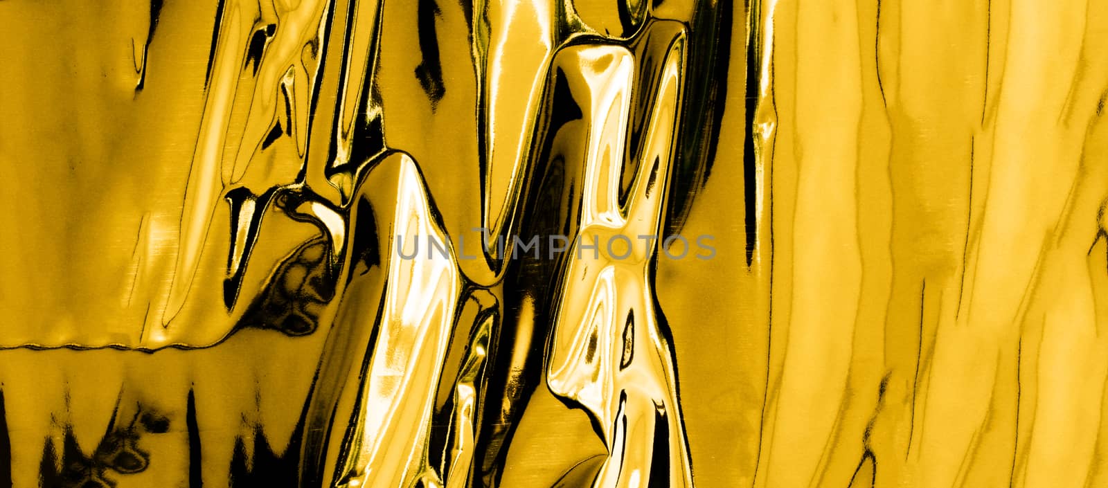silver - mercury looking background with shinny gold reflection with copy space
