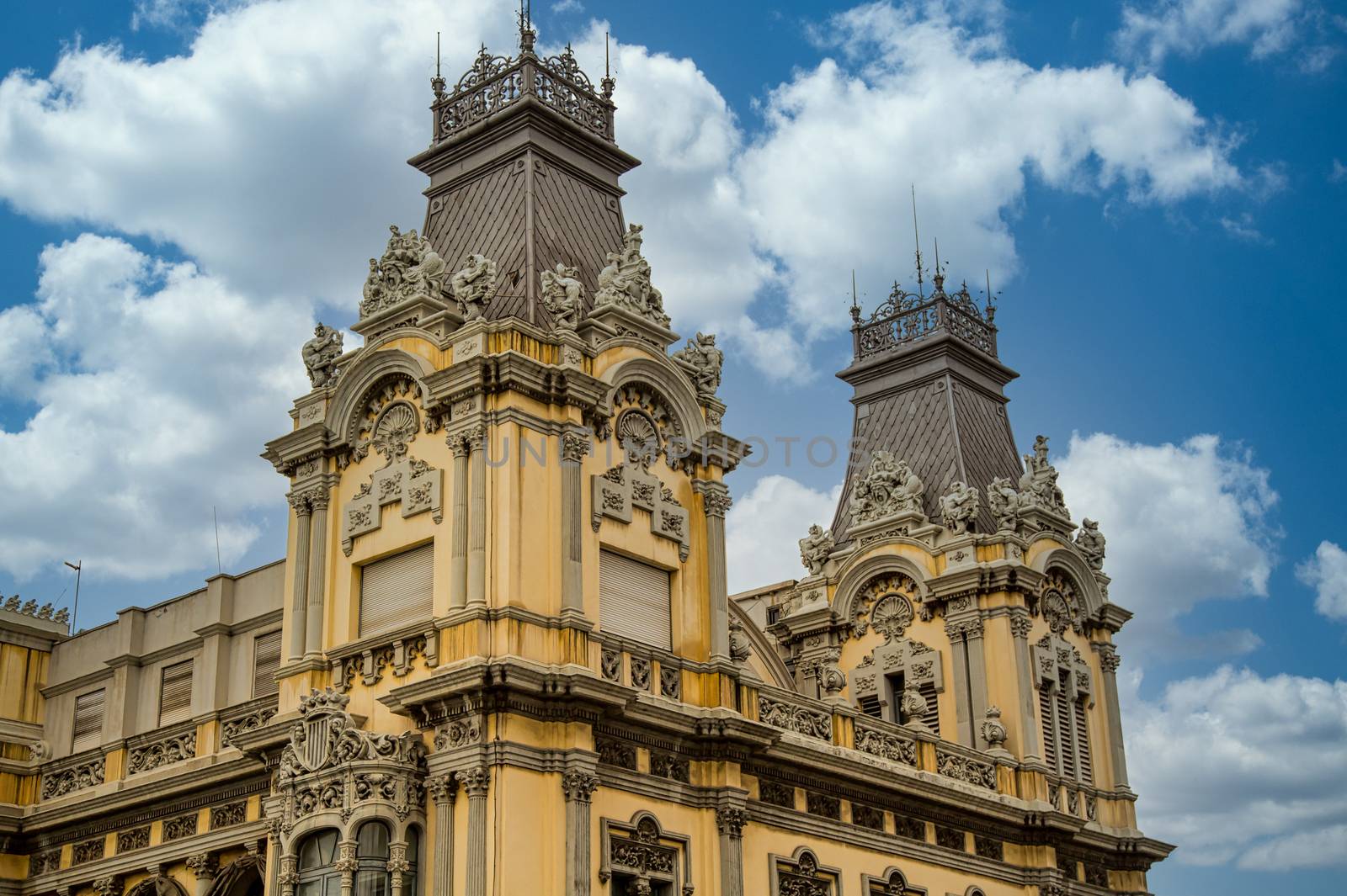 Roof and two towers at the top of an old Barcelona hotel