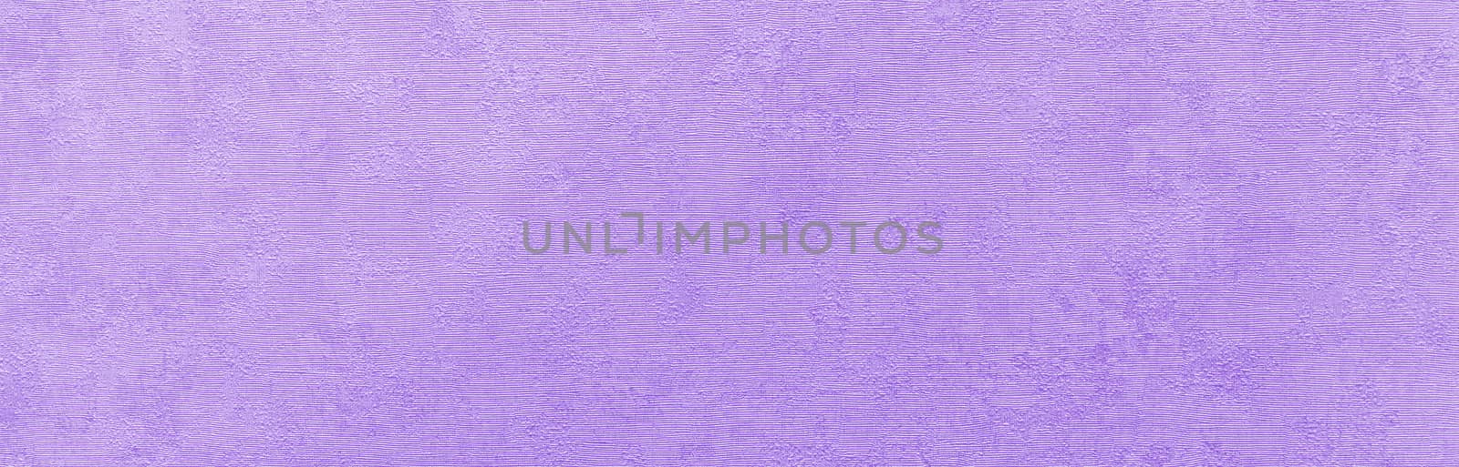 Abstract grungy decorative texture. Textured paper with copy space. The mottled surface of the paper is purple, texture closeup.
