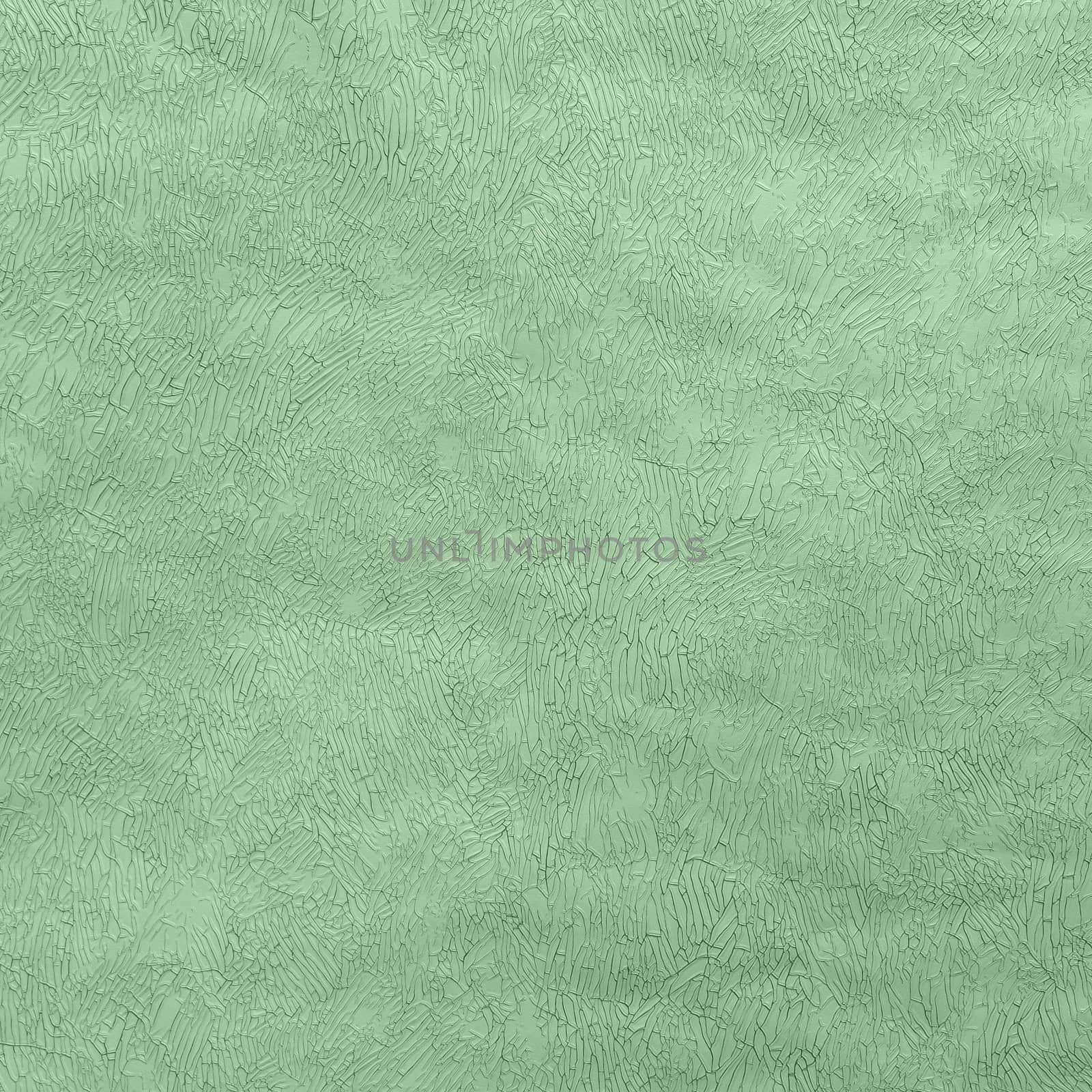 Abstract grungy decorative texture. Textured paper with copy space. Motley green paper surface, texture closeup.