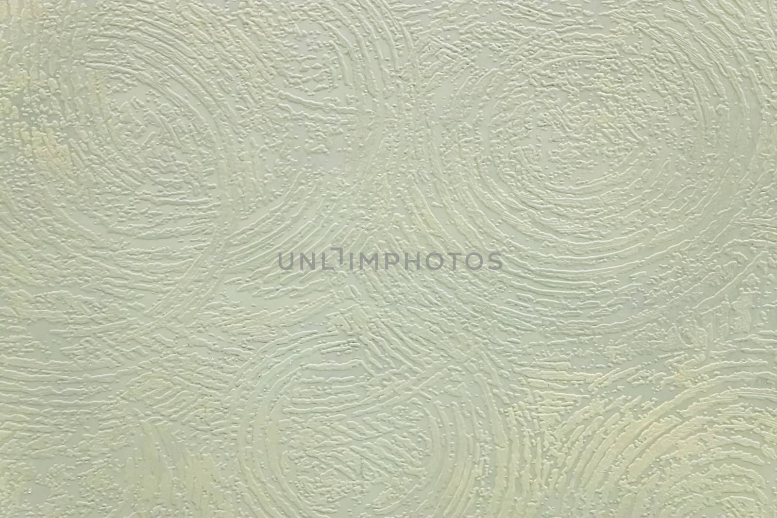Abstract grungy decorative texture. Textured paper with copy space. Motley green paper surface, texture closeup.