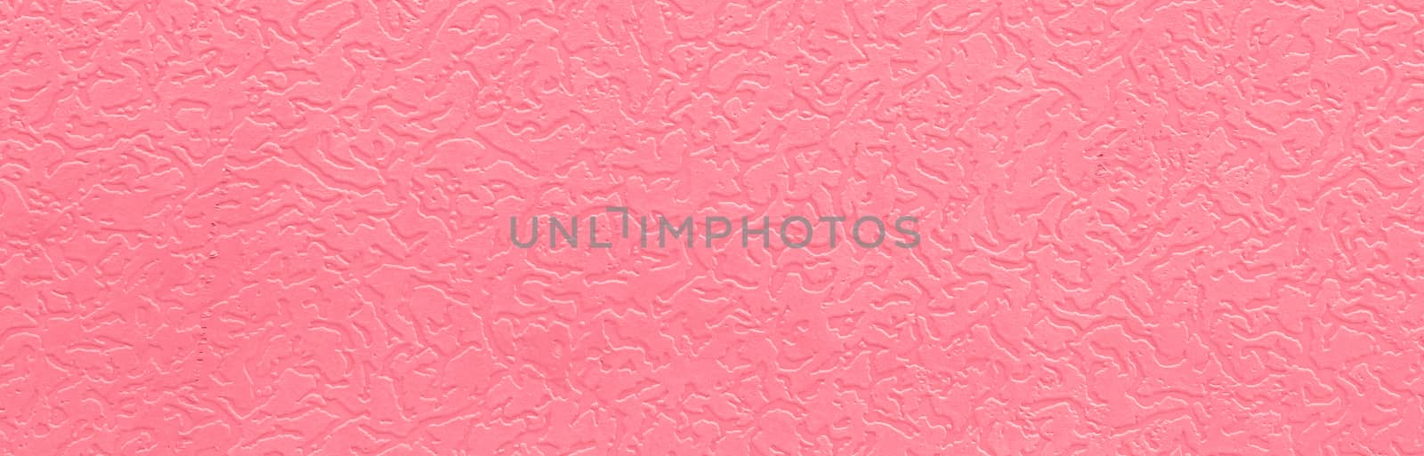 Abstract grungy decorative texture. Textured paper with copy space. The mottled surface of the paper is pink, texture closeup.