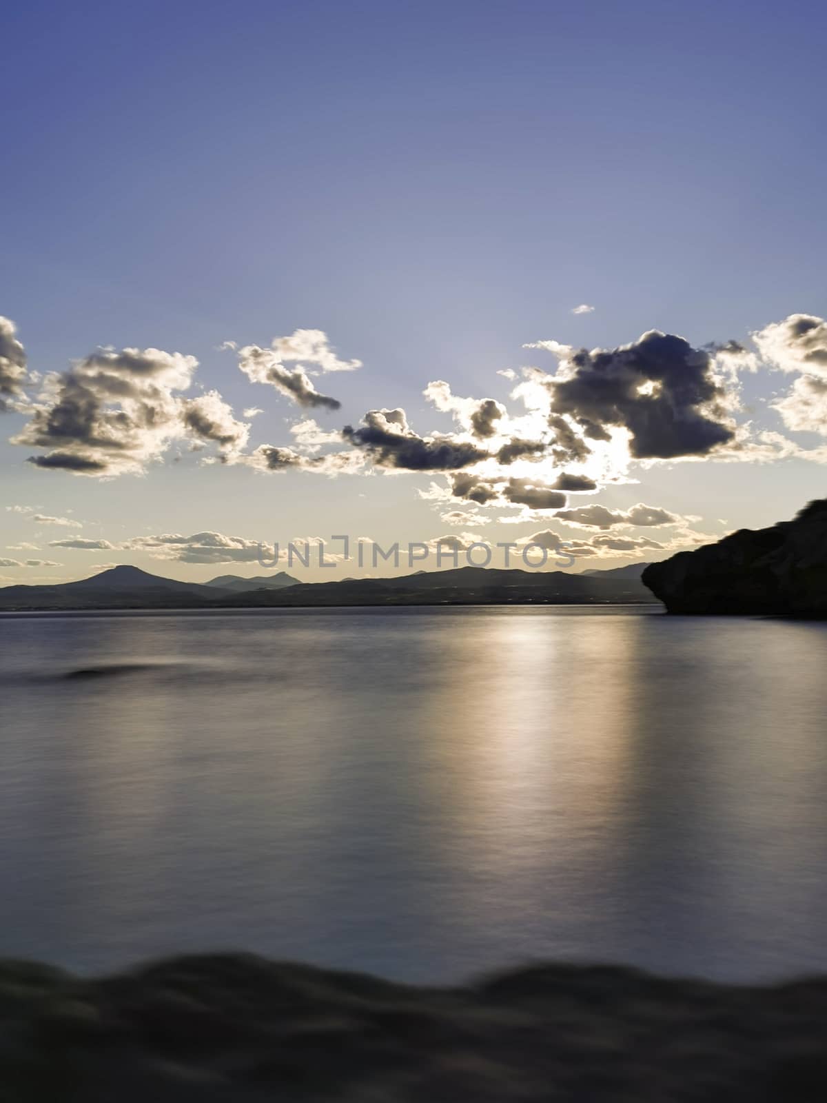 Cape Melagkavi shoreline at gulf of Corinth, Greece. Sunset.