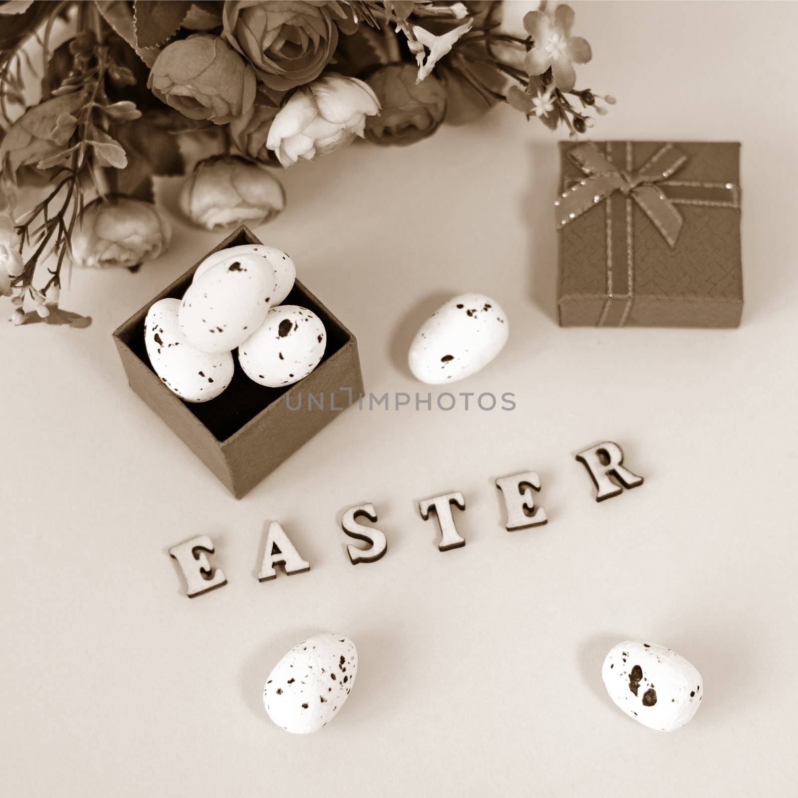 Festive Easter card with a bouquet of roses and a red box.