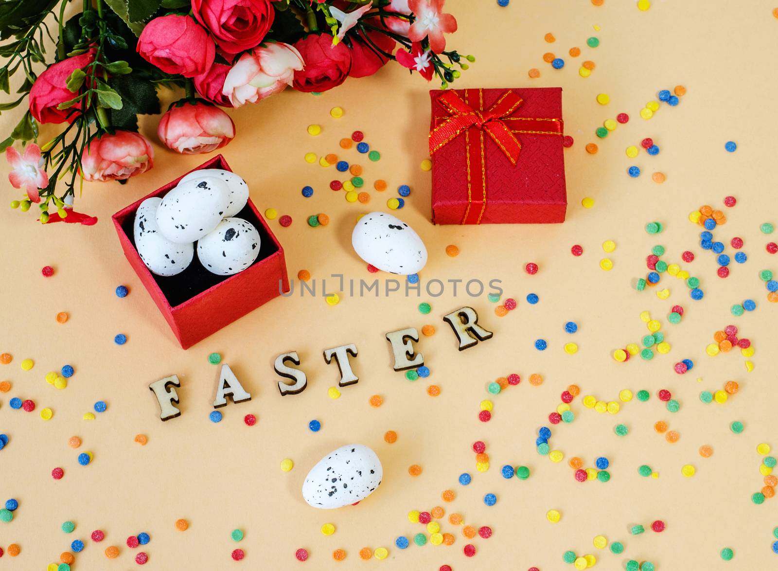 Festive Easter card with a bouquet of roses and a red box.