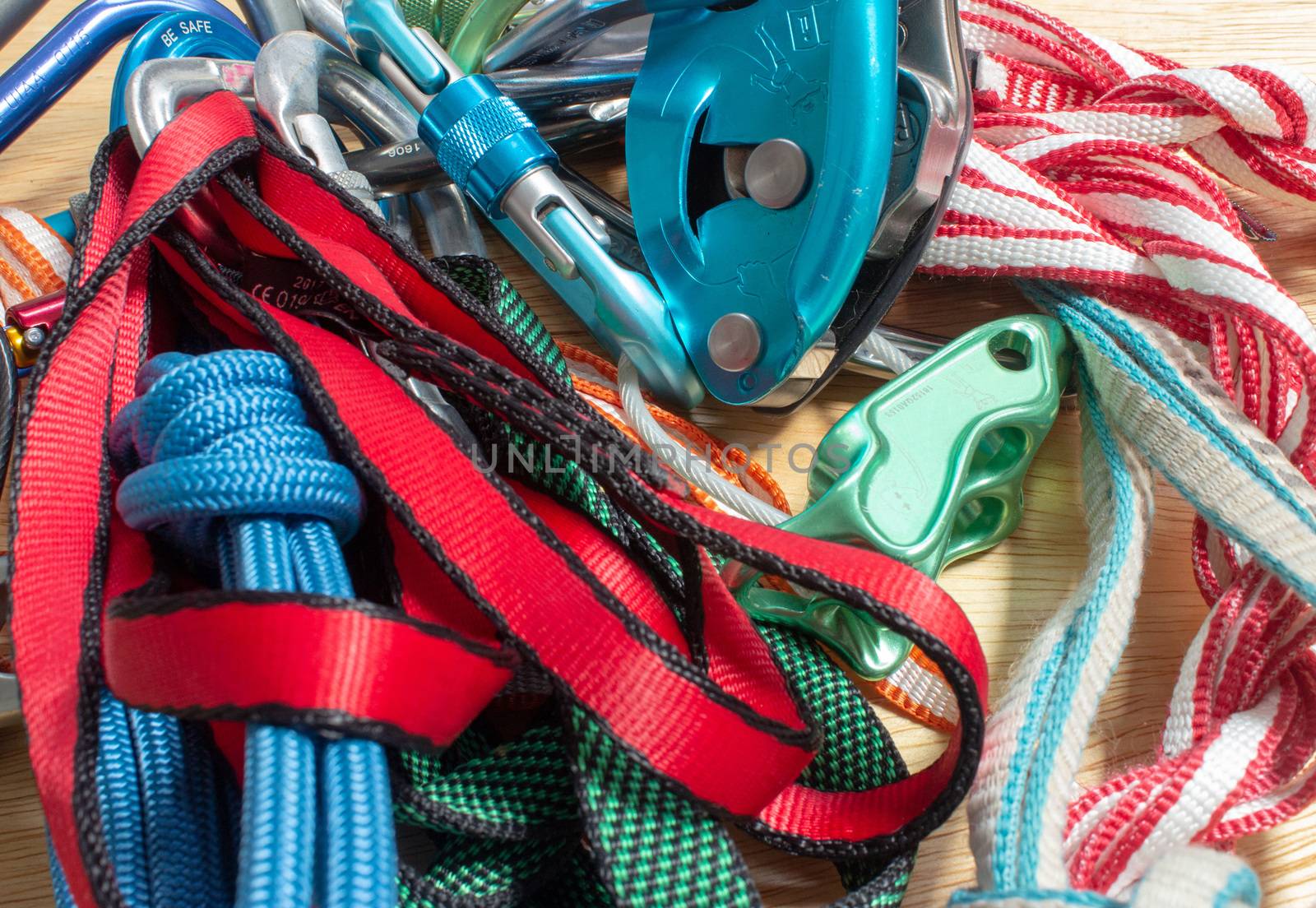 Rock climbing rack, with belay devices, carabiners, quickdraws, slings and cords
