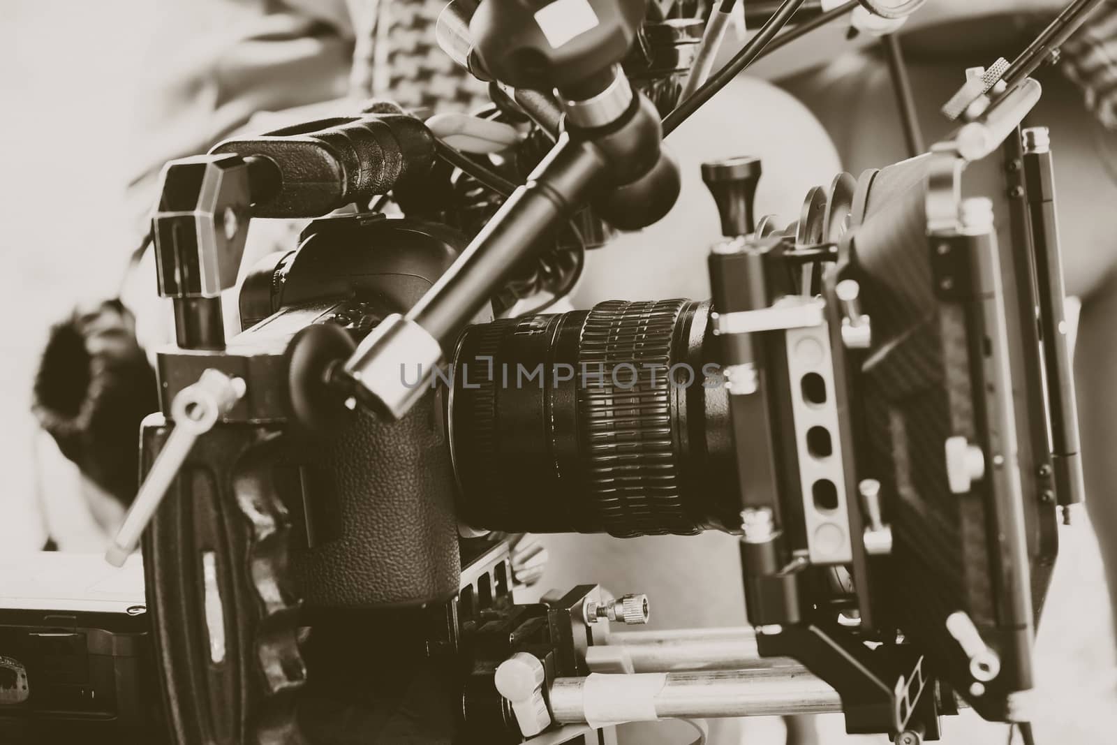 Film industry. Filming with professional camera background