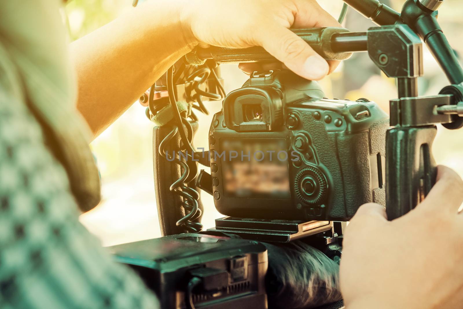 Film industry. Filming with professional camera background