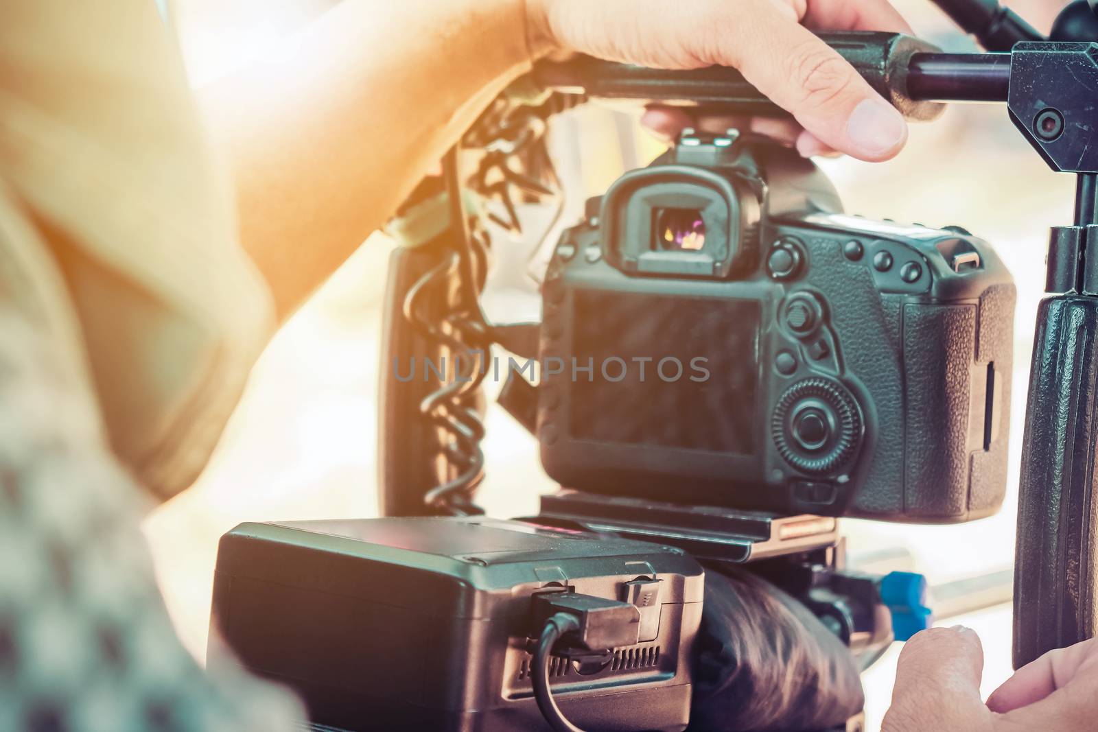 Film industry. Filming with professional camera background
