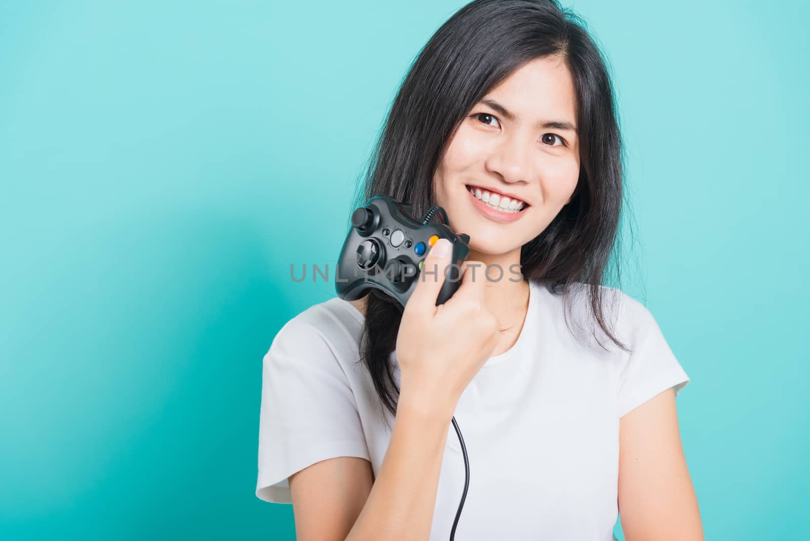 woman wear t-shirt gamer with a joystick by Sorapop