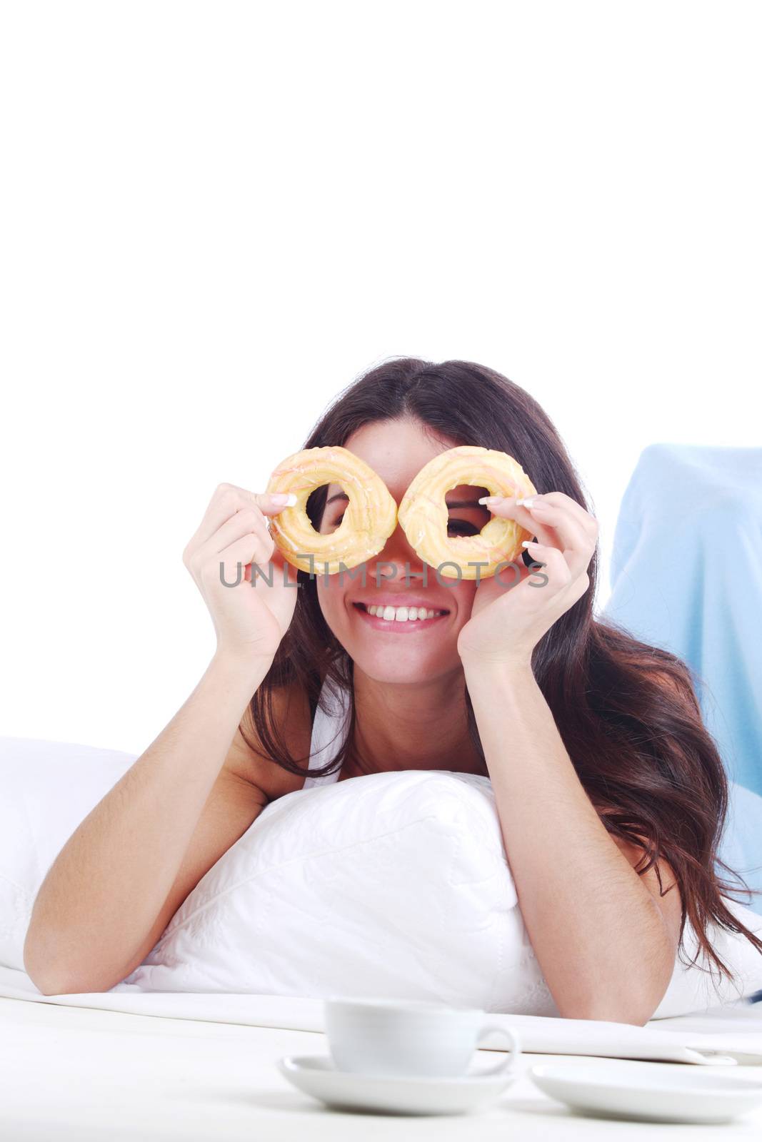 woman wake and see morning coffee and donuts