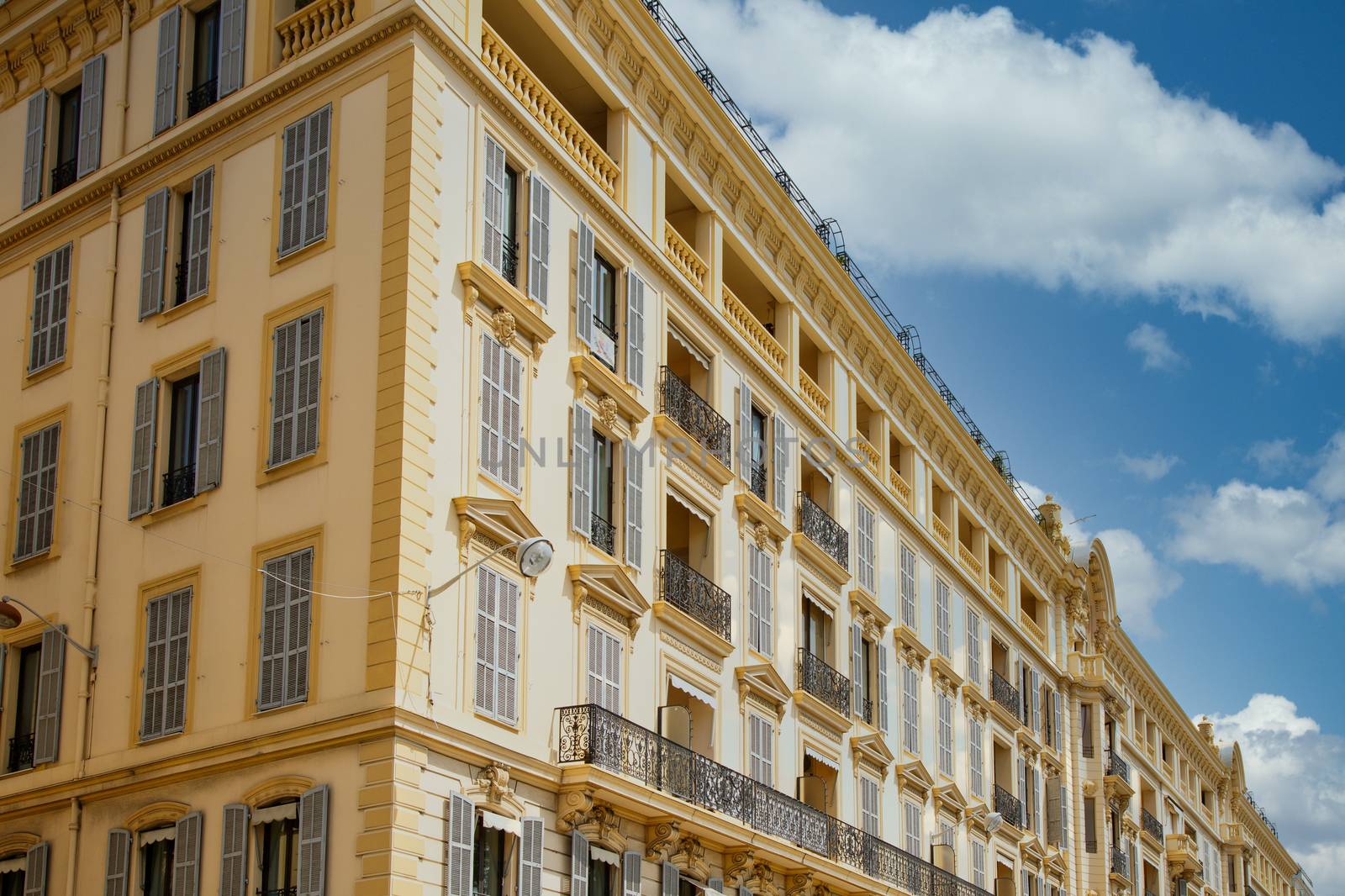 Large Yellow Apartment Building in Nice by dbvirago