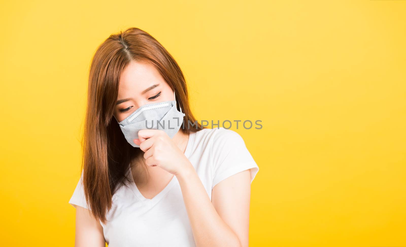 woman teen standing cough in mask protection from virus epidemic by Sorapop