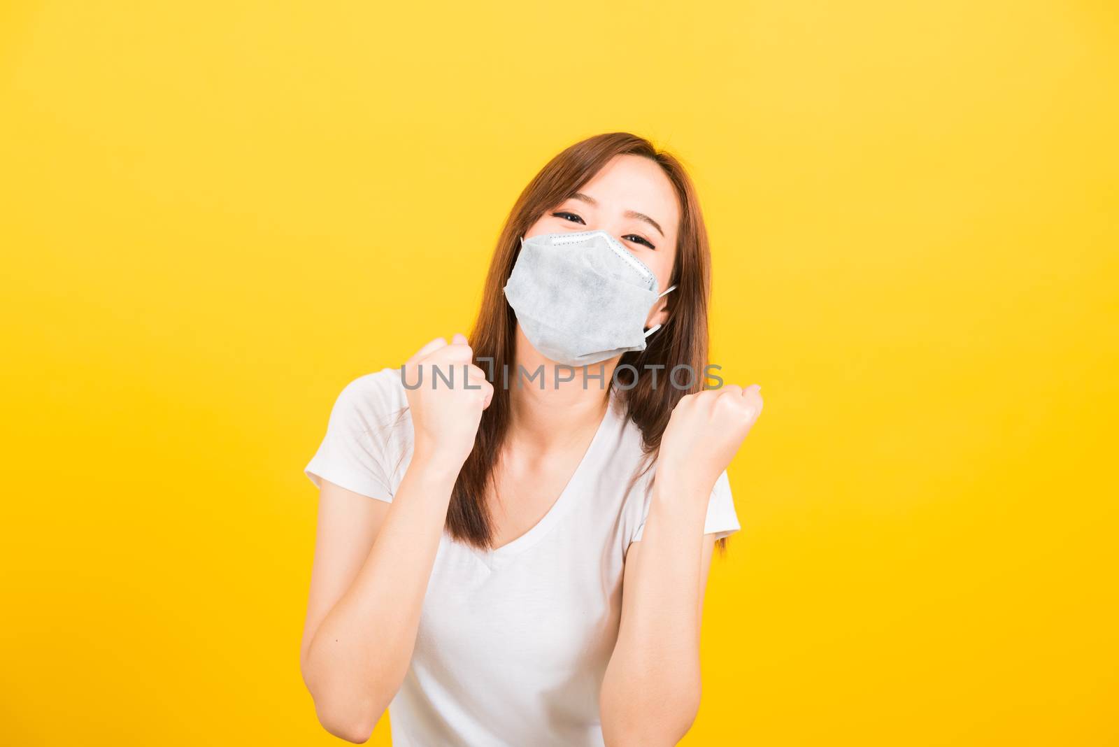 woman wearing face mask protects filter dust pm2.5, virus and ai by Sorapop