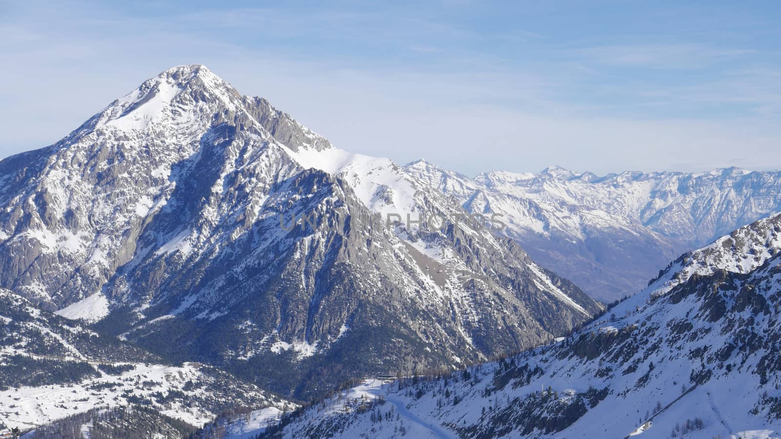 snowy landscape of Montgenvre in the high Alps in winter, france