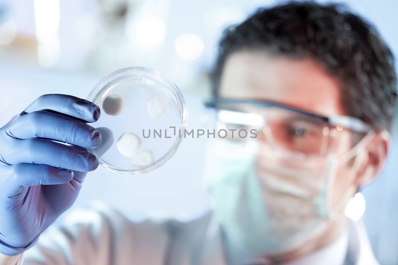 Scientist working in the corona virus vaccine development laboratory research facility. Corona virus pandemic concept. Development of virus treatment drug.