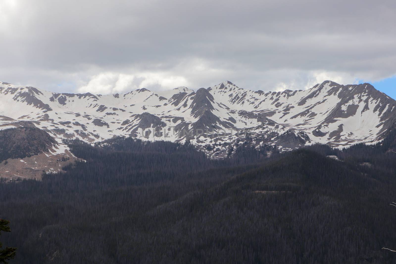 A view of the snow covered Colorado mountains by gena_wells