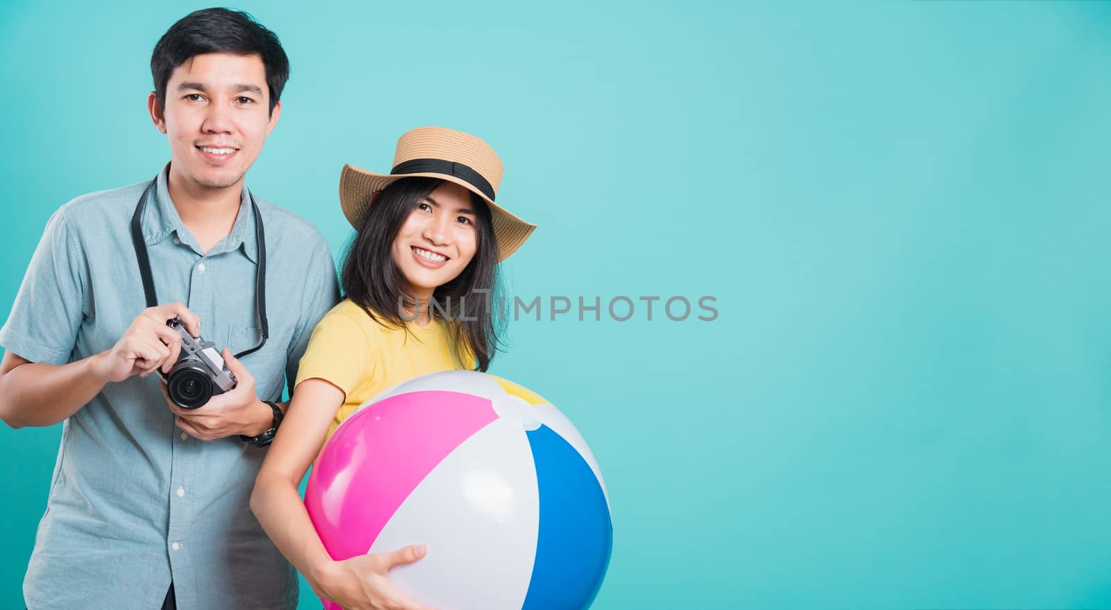 young beautiful woman handsome man couple in summer in holiday t by Sorapop
