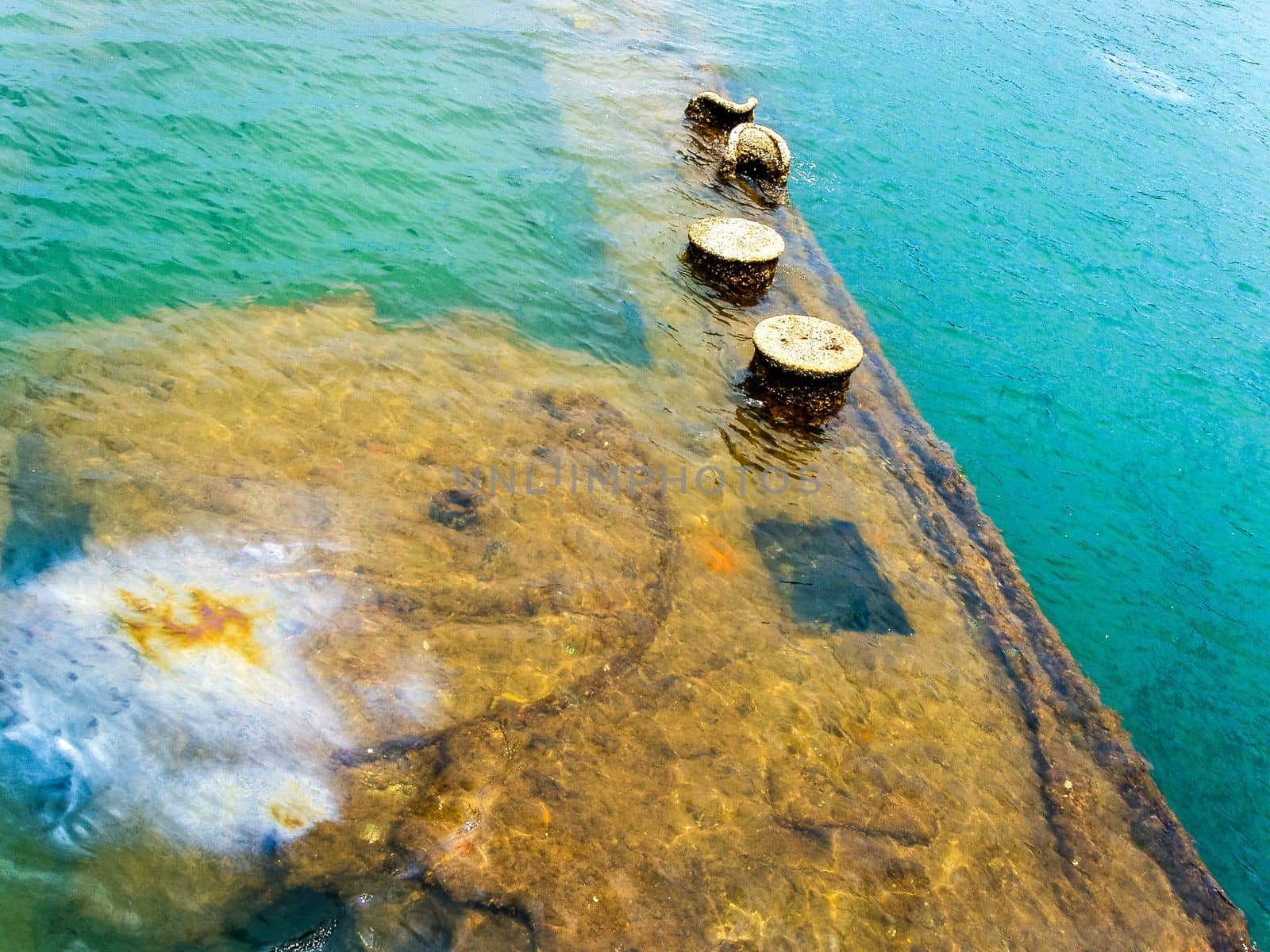 View from the Pearl Harbor Memorial of USS Arizona, commemorating the loss of 1,177 crewmen who lost their lives here during the attack on Pearl Harbor.