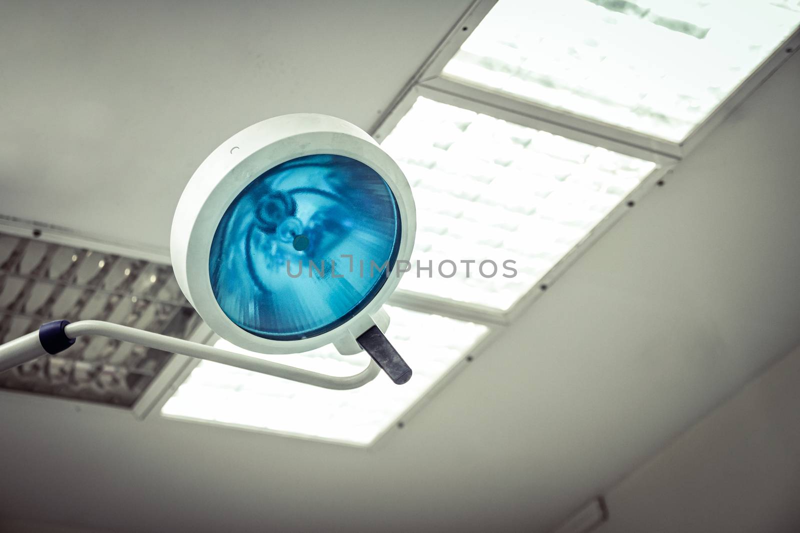 Lamp inside operating room in a hospital. Close up view with copy space.