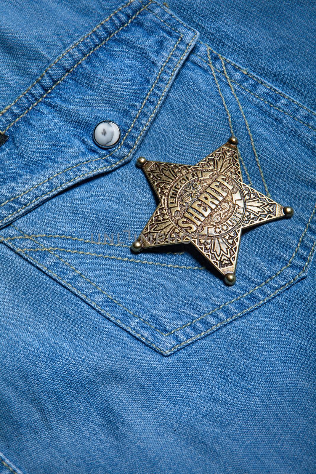 Star badge on a fabric background